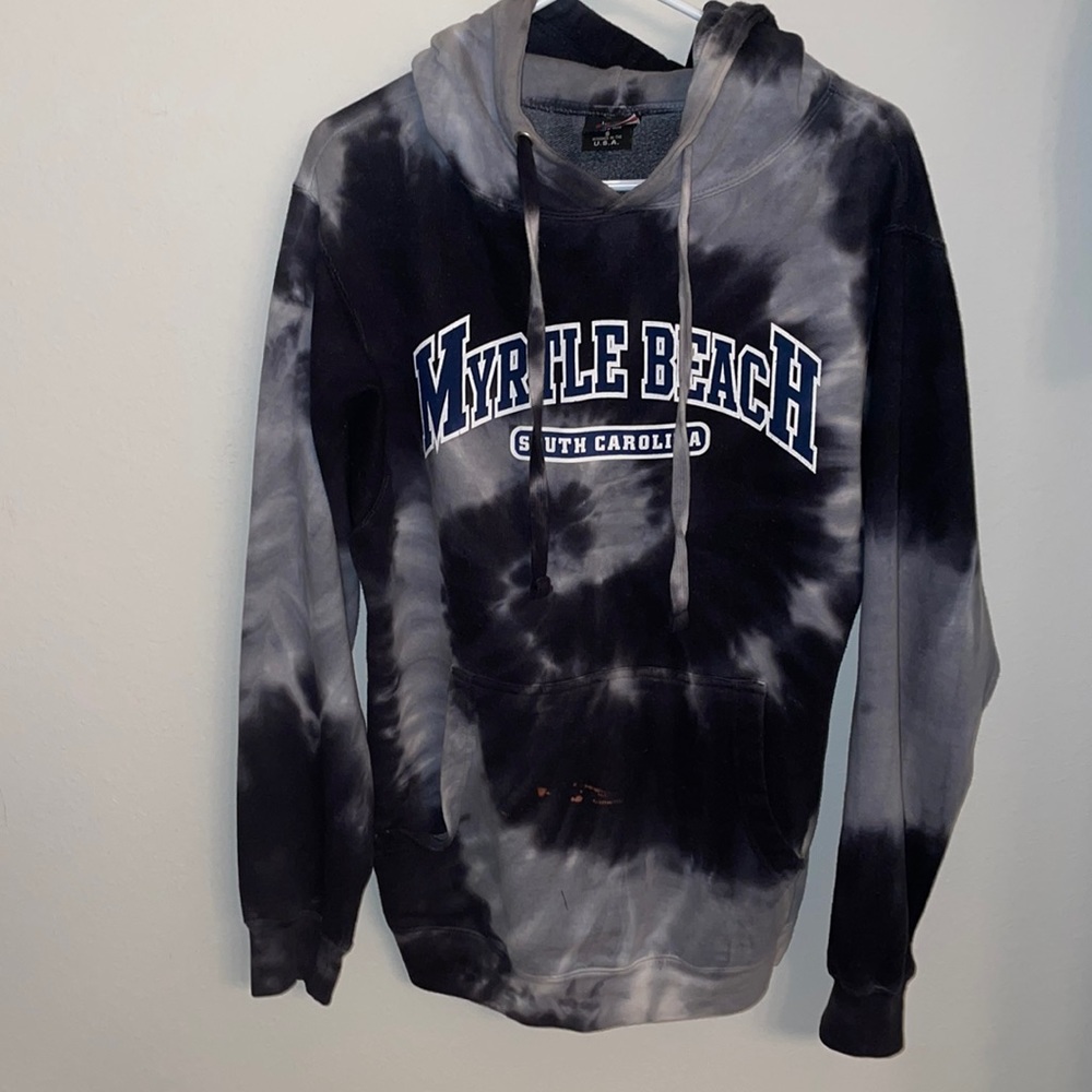 Too big, Does have a bleach stain but has style to it.